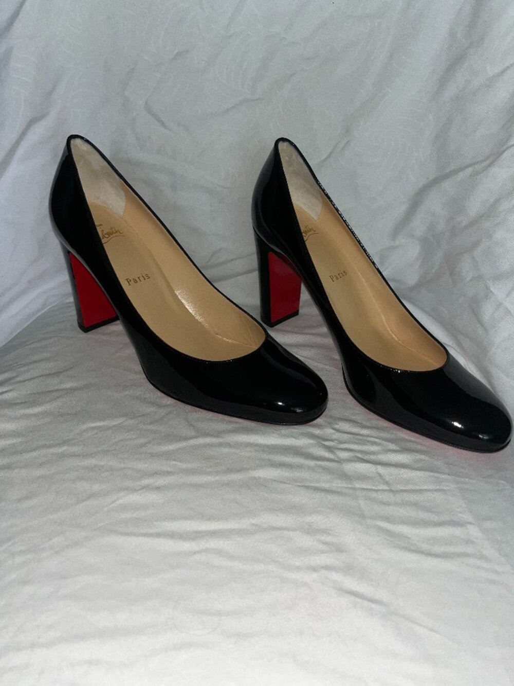 Christian Louboutin red bottom black heels